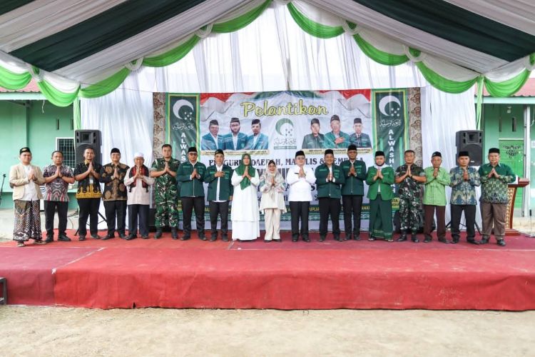 Wesly Silalahi Serahkan Santunan Rp15 Juta untuk Anak Yatim di Pelantikan Al Washliyah