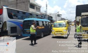 kemacetan di jalan patuan nagari berhasil diurai polisi