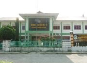 dugaan penyelewengan dana bos, kepala smk negeri 3 siantar diadukan ke kejari simalungun