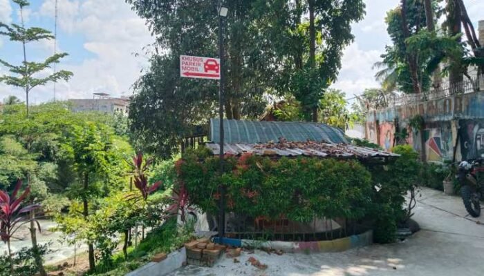asn siantar diduga kuasai das bah bolon jadi kafe, diamnya wesly silalahi dianggap restui pelanggaran
