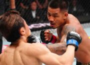 joshua van, kanan, berhasil mempertahankan sabuk juara kelas terbangnya setelah meraih kemenangan penuh perjuangan atas tatsuro taira di ufc 328.