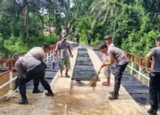 polres tapteng tuntaskan renovasi jembatan merah putih presisi di desa satahi nauli