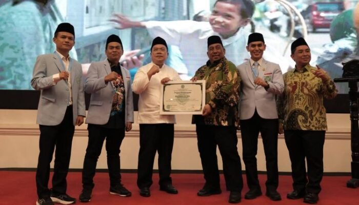 dari pematangsiantar ke panggung nasional, wesly silalahi raih penghargaan bkprmi
