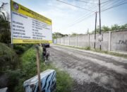 Pengaspalan jalan paluh gelombang di percut sei tuan berlanjut pengaspalan jalan paluh gelombang di percut sei tuan berlanjut