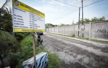 Pengaspalan jalan paluh gelombang di percut sei tuan berlanjut pengaspalan jalan paluh gelombang di percut sei tuan berlanjut